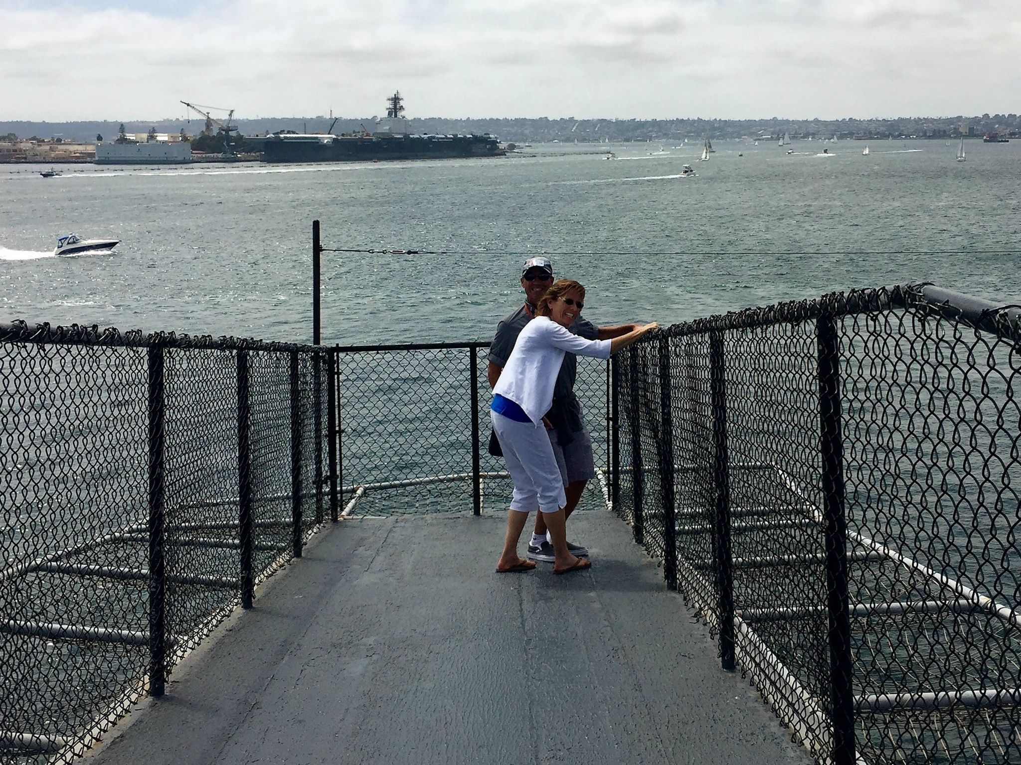 Sandra and I playing chicken on the viewing deck off the bow of the carrier.