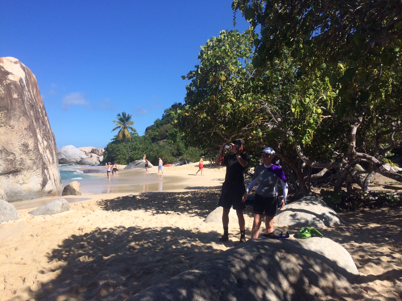 Behind us, the beach we swam to.