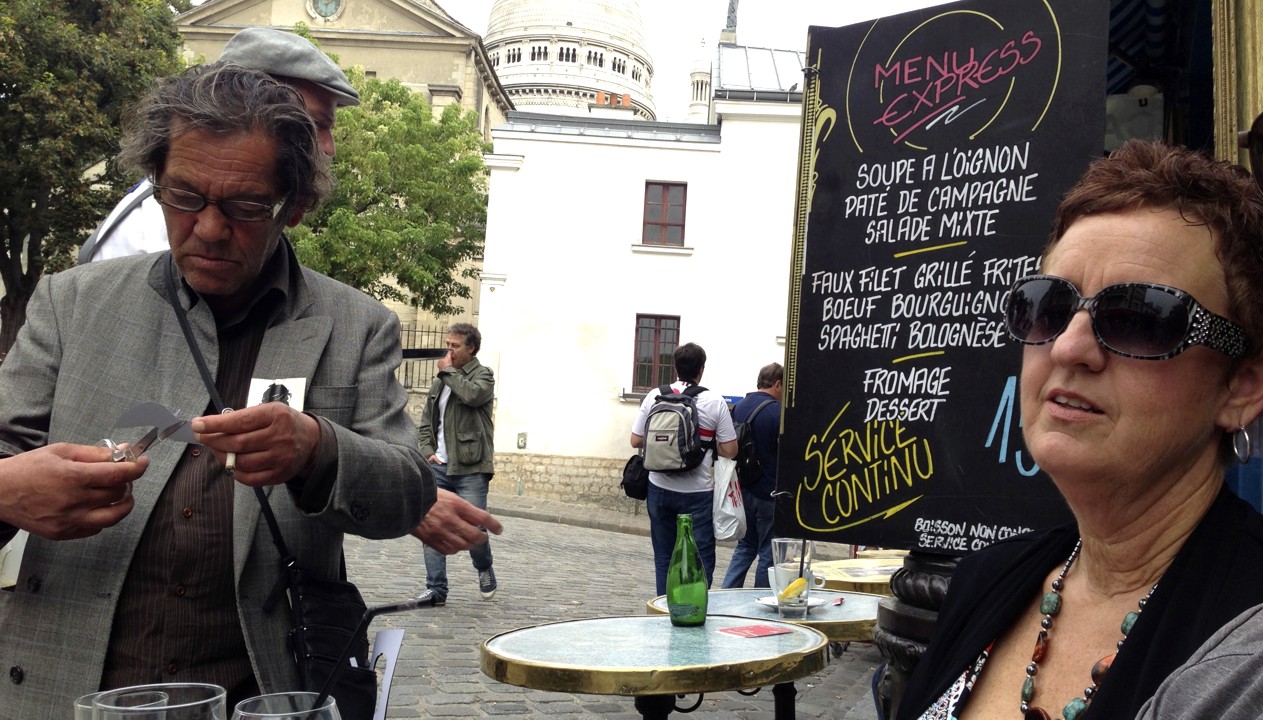 This guy cut out a silhouette of Maryanne. June eventually gave him 5 euros to go away