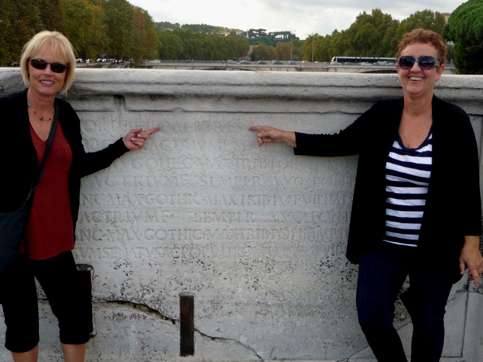 Small piece of the original bridge with inscriptions stapled in place.