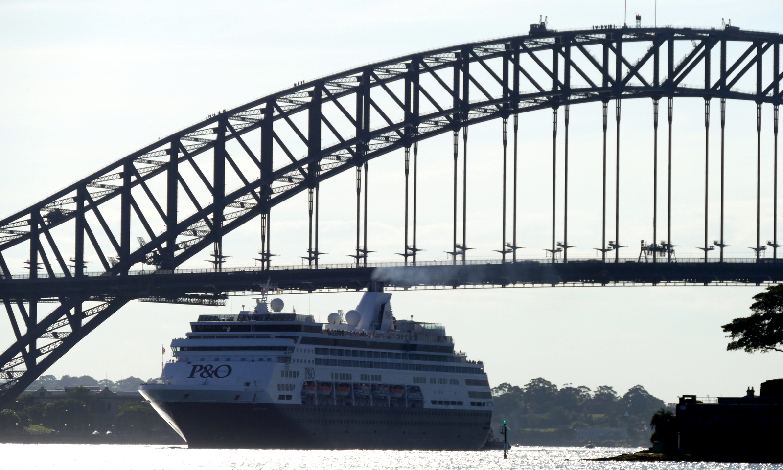 We met in downtown Sydney for dinner. I took the ferry from the golf course. A big tourist attraction is to walk up the suspension of the bridge. You can barely see people going up, and more at the top.