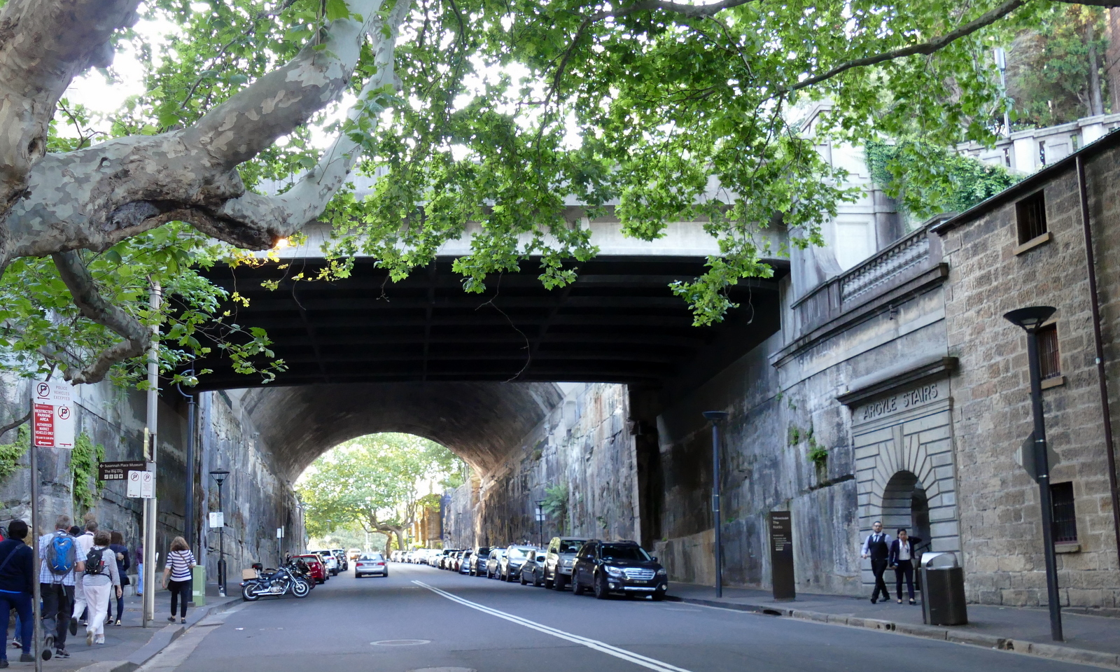 A freeway underpass going to the bridge.