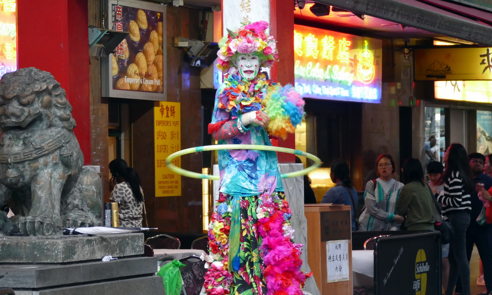 ... and a super tall Chinese woman twirling a hula-hoop...