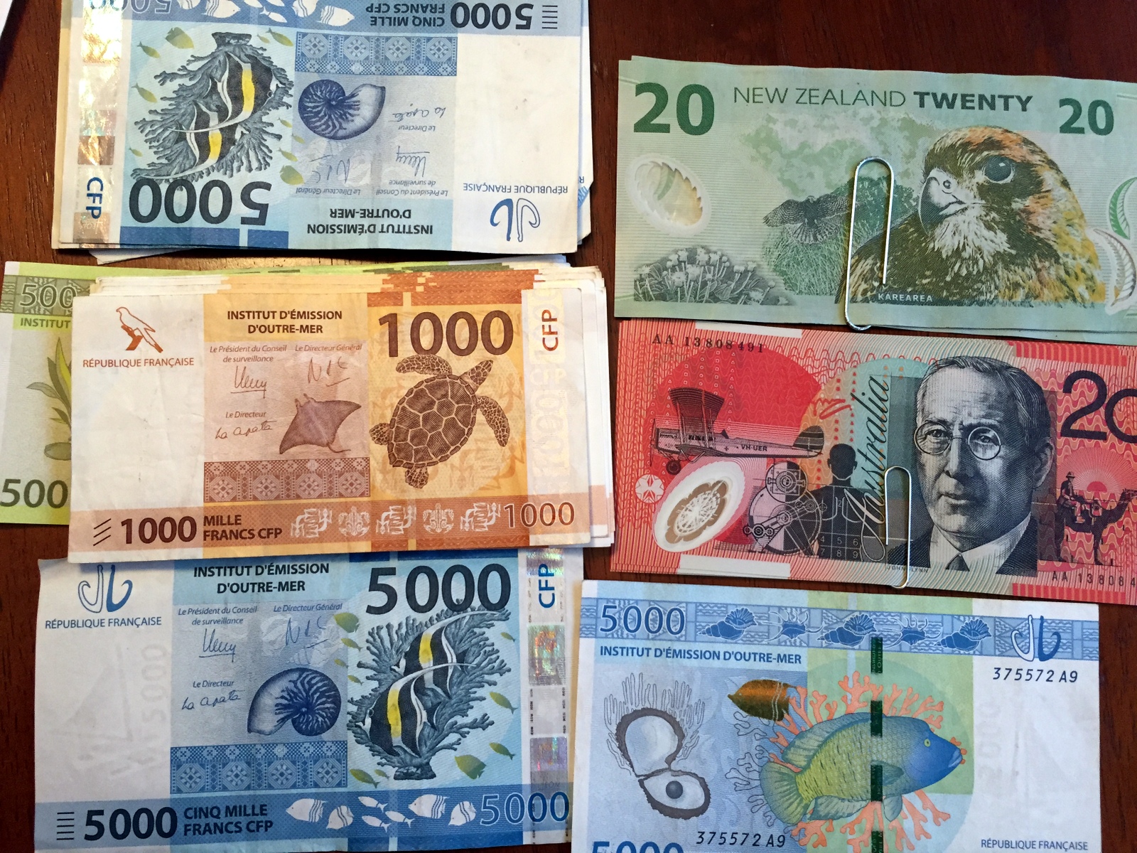 Colorful Tahitian francs with fish (the $20 are New Zealand Currency)