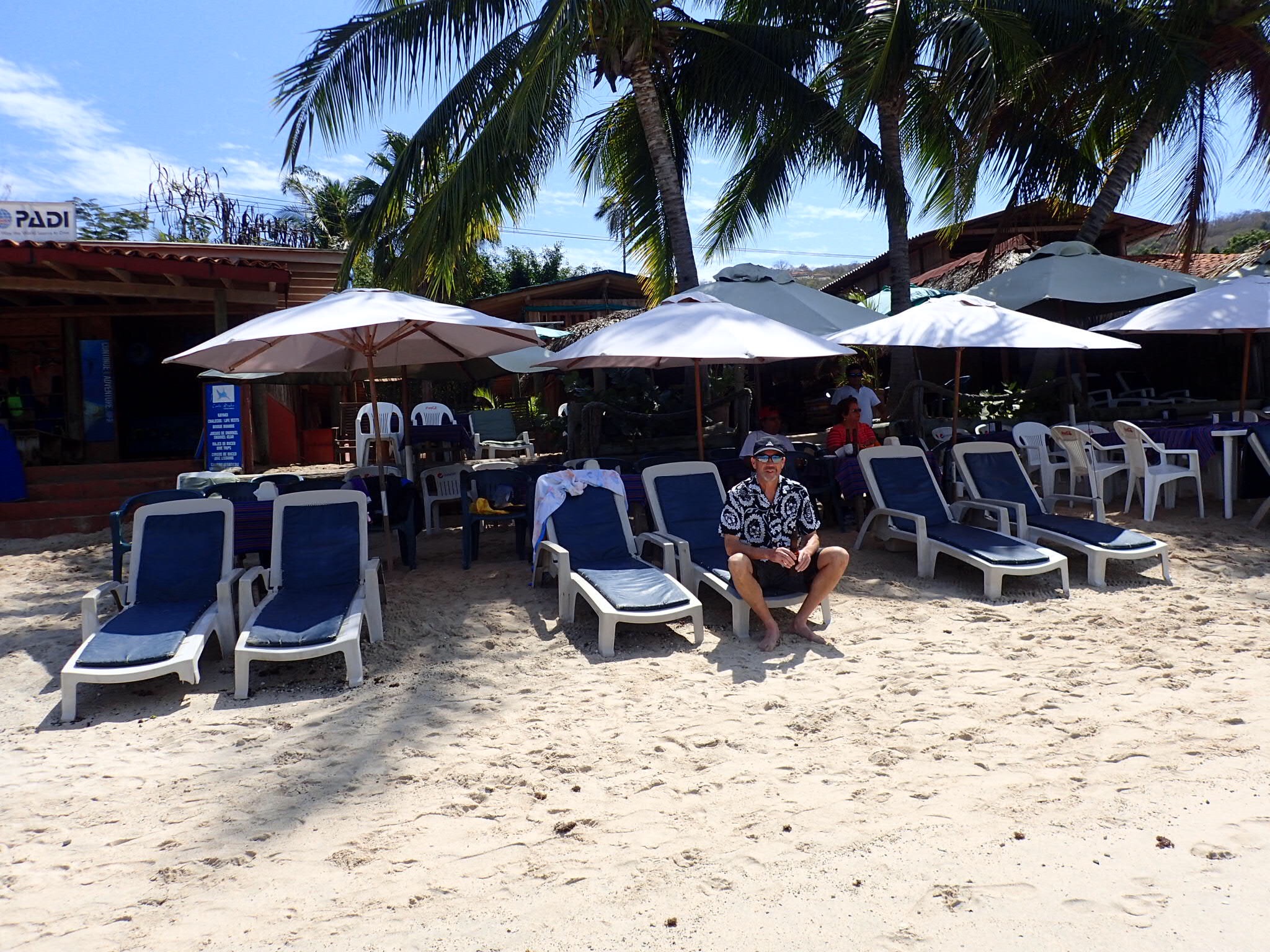 Sitting on the beach drinking beer for 25 pesos ($1.25)